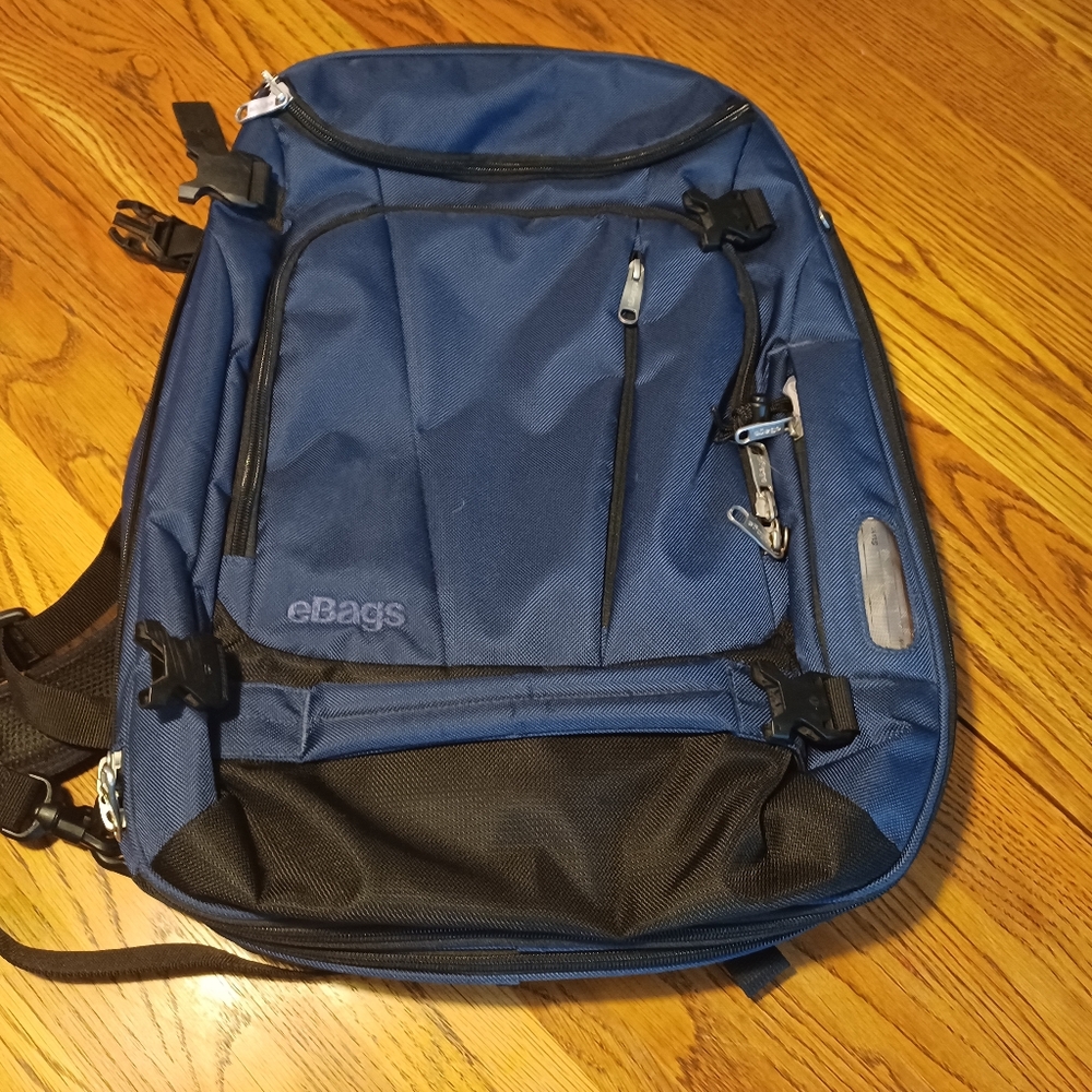 two eBags nylon backpacks (one navy, one grey), EUC.